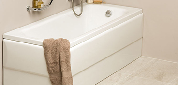 VitrA Balance bath with towel draped on the side